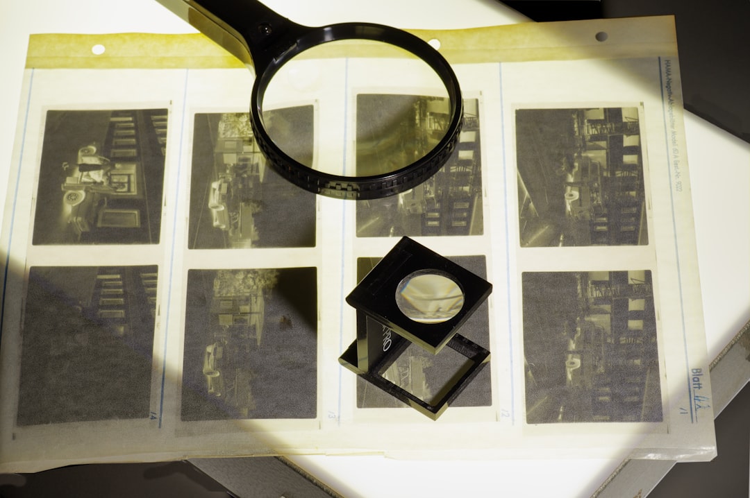 a magnifying glass sitting on top of a book